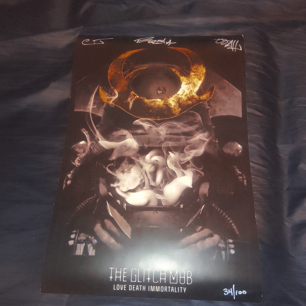 The Glitch Mob Poster with Gold and Black Design